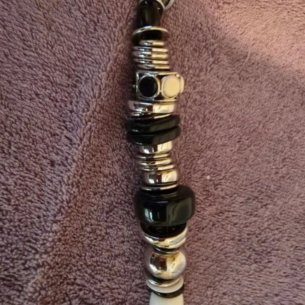 Black, White, Silver Metal Necklace on leather roping. - Picture 2 of 2